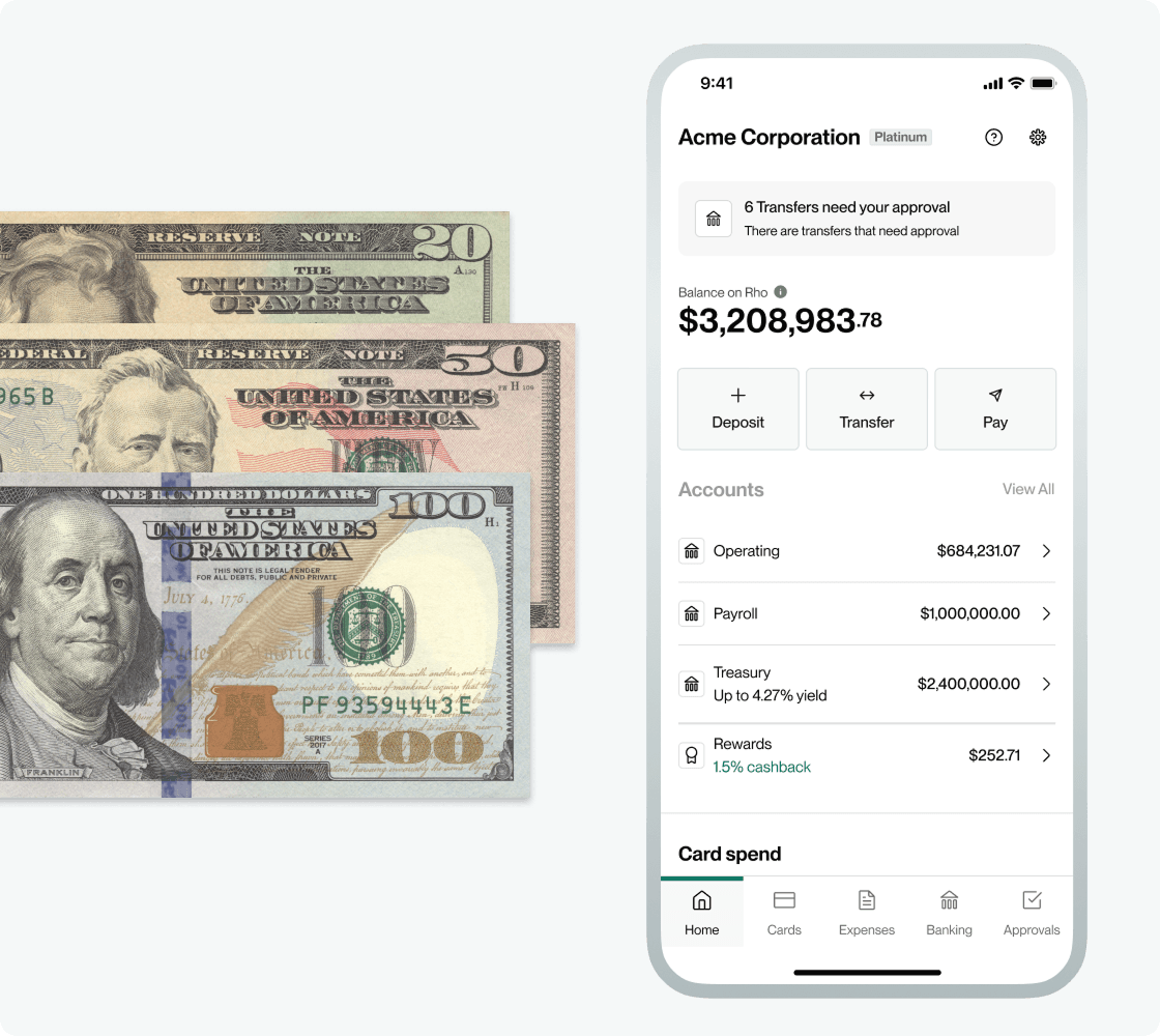 U.S. currency bills beside a smartphone displaying a banking app with account balances and transaction options.
