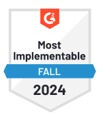 G2 badge titled "Most Implementable" for Fall 2024, featuring a red hexagon and blue banner design.
